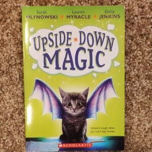 Scholastic Upside-Down Magic Book with Green and Purple Cover
